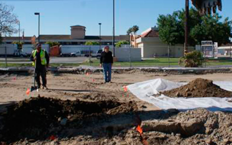 Backfilled and compacted excavation area prepared for new construction.