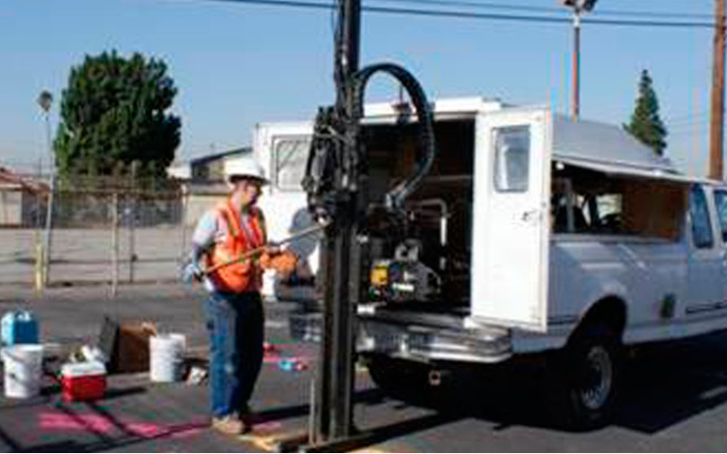 Geoprobe rig advancing a boring for subsurface sampling.